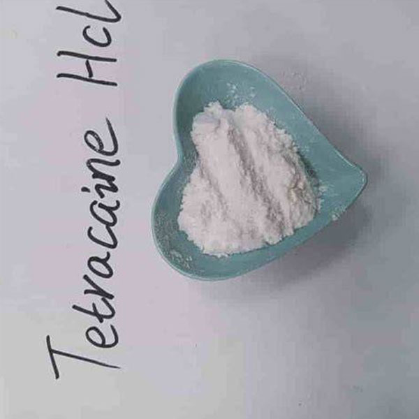 A sealed, pharmaceutical-grade container of high-purity Tetracaine Hydrochloride crystalline powder on a sterile laboratory workstation.