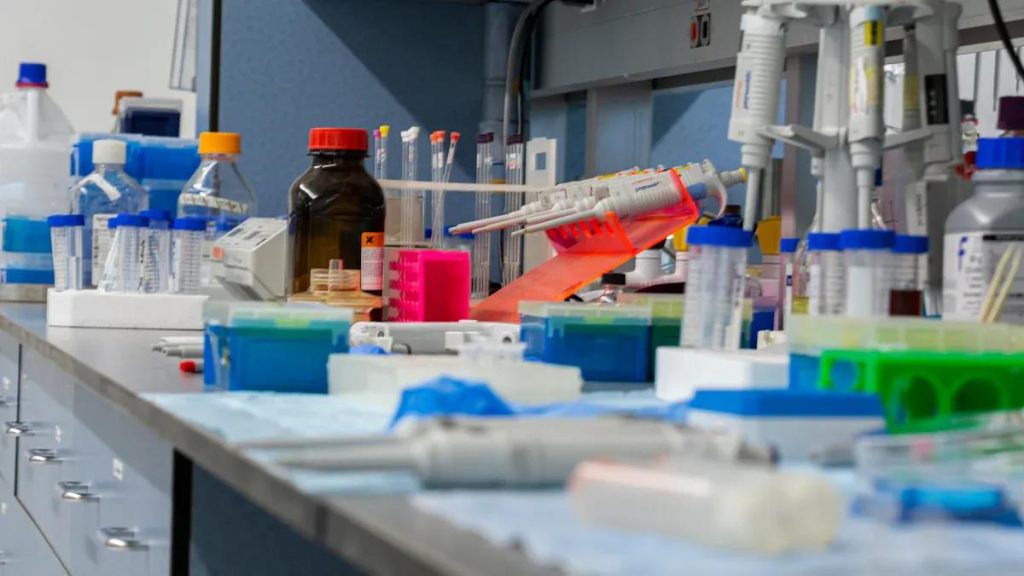 Research chemicals and laboratory compounds displayed in a modern scientific research laboratory.